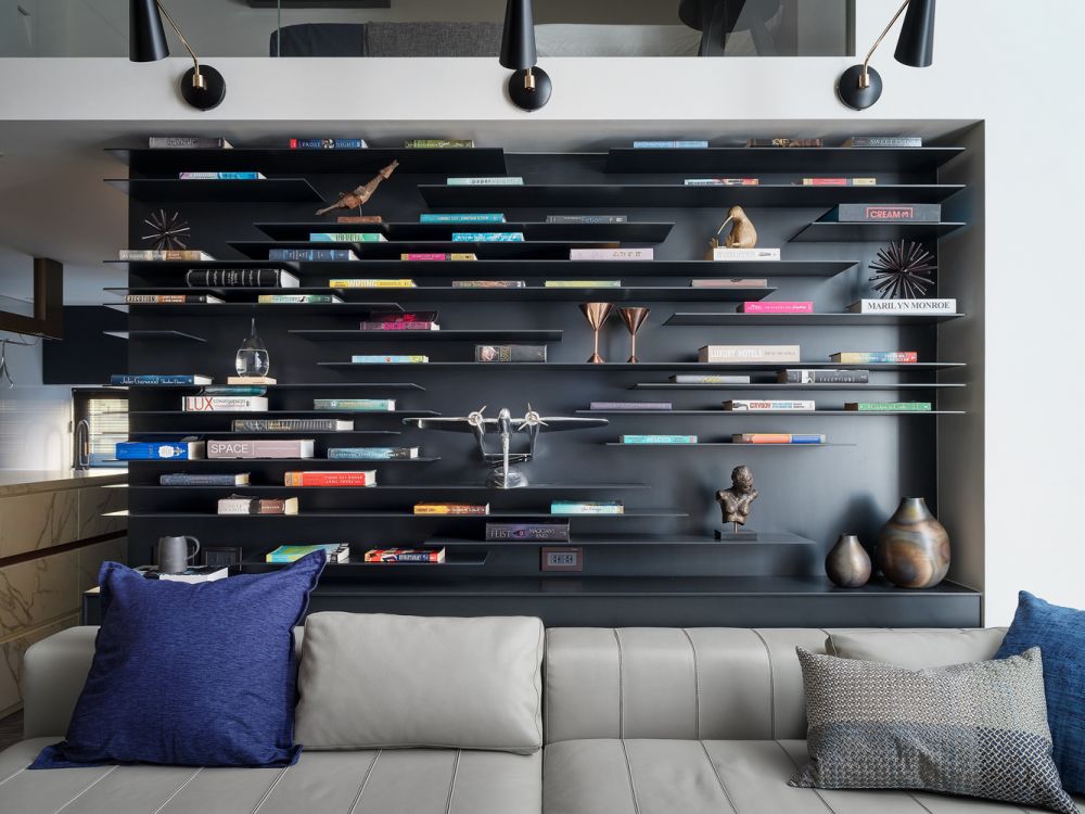 The palette of colors and materials featured throughout the apartment is limited to a few simple choices