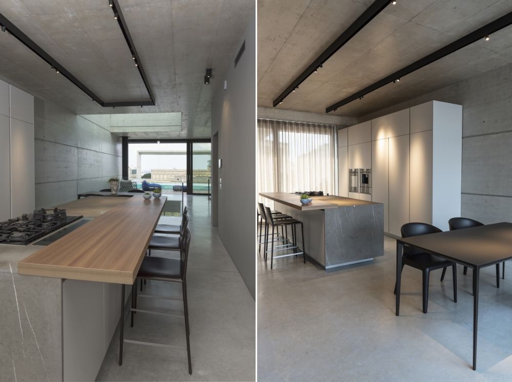 The kitchen is longer more than it is wider and has room for a large island with a built-in stove top