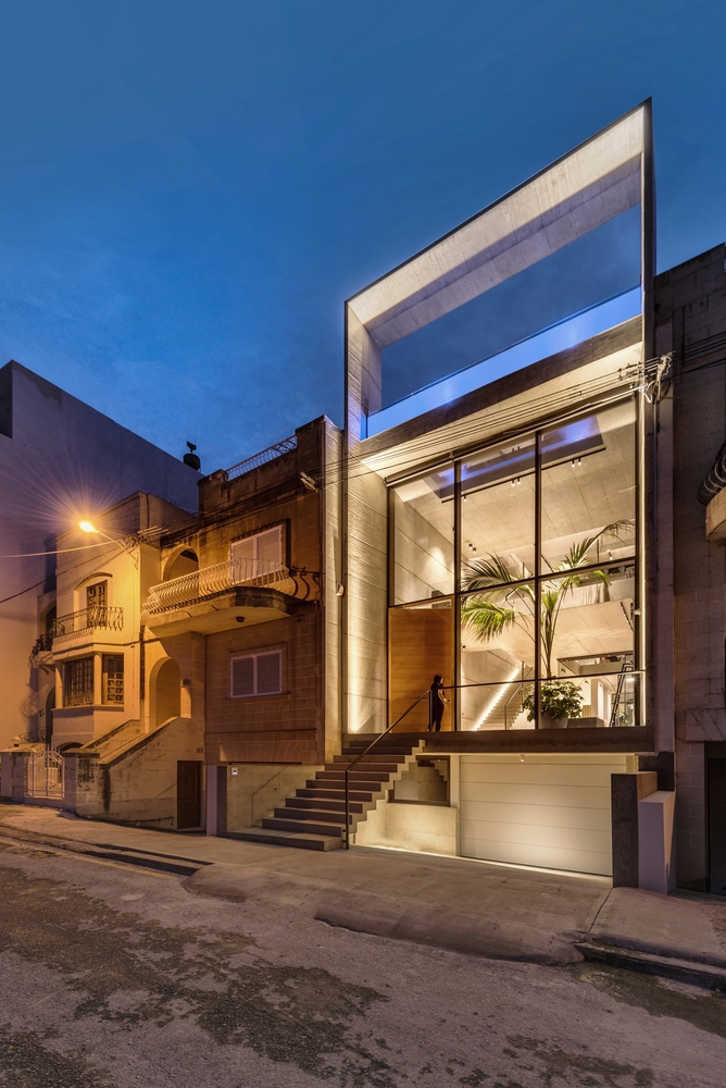 At night the house lights up and becomes even more eye-catching than usual