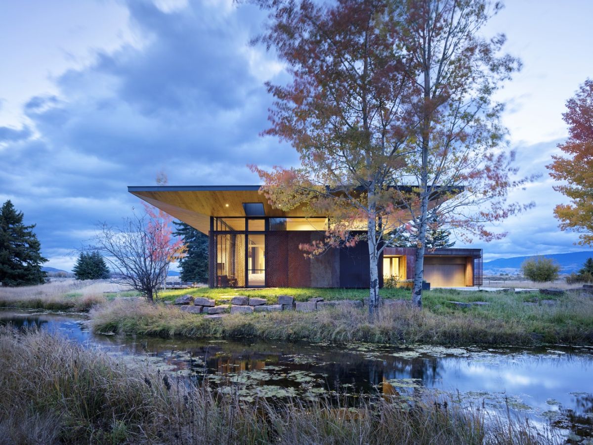 Deep protective overhangs extend the roof over the sides making the indoor-outdoor transition even more seamless