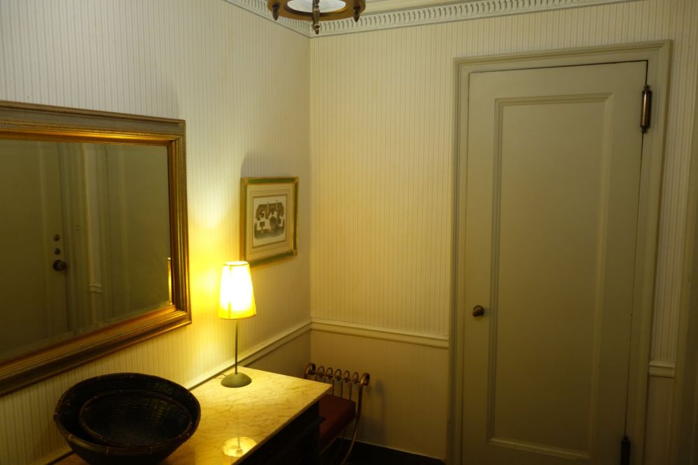The entrance hall, although spacious, didn't have character and lacked color