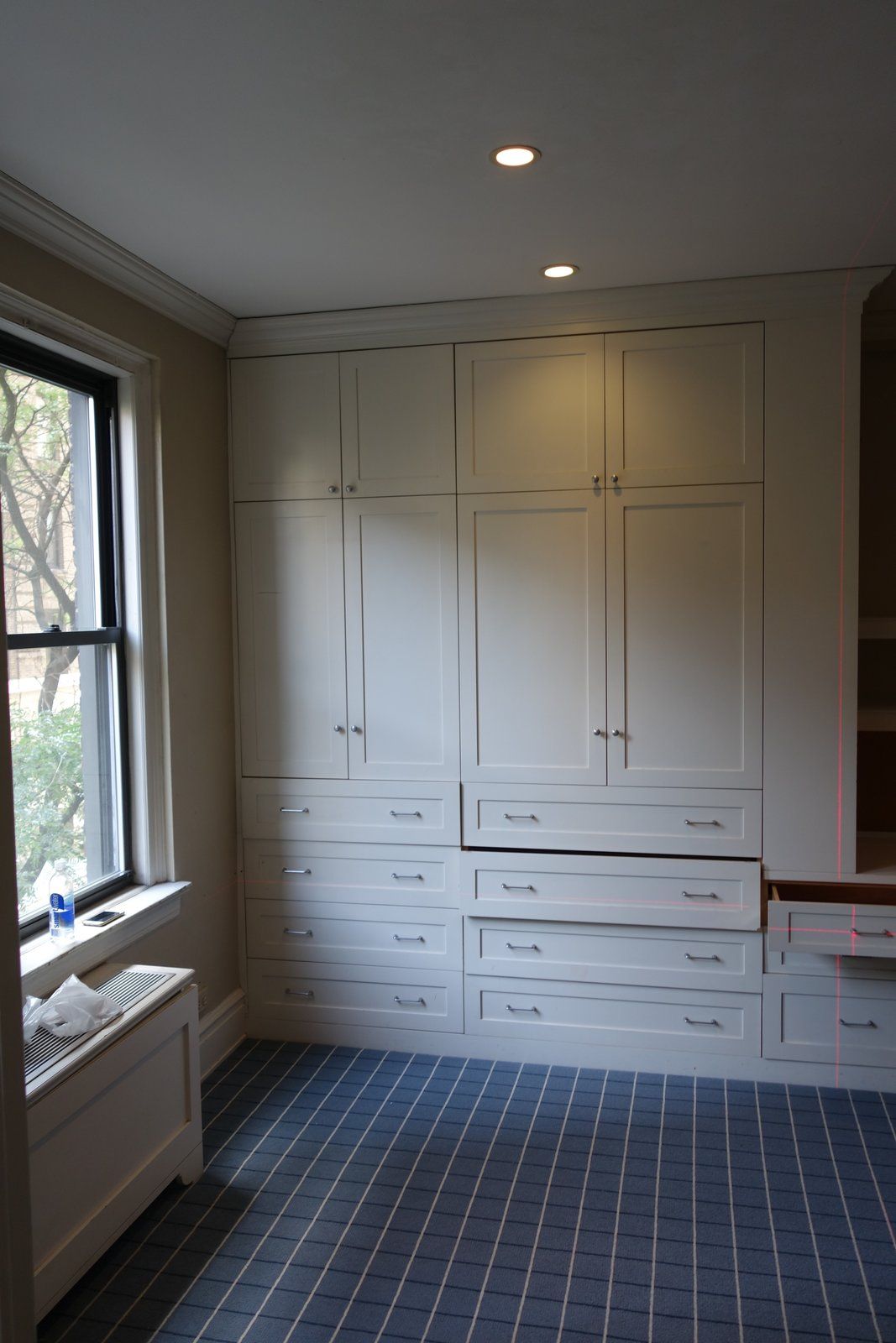 The second bedroom originally featured a large wall unit with lots and lots of storage
