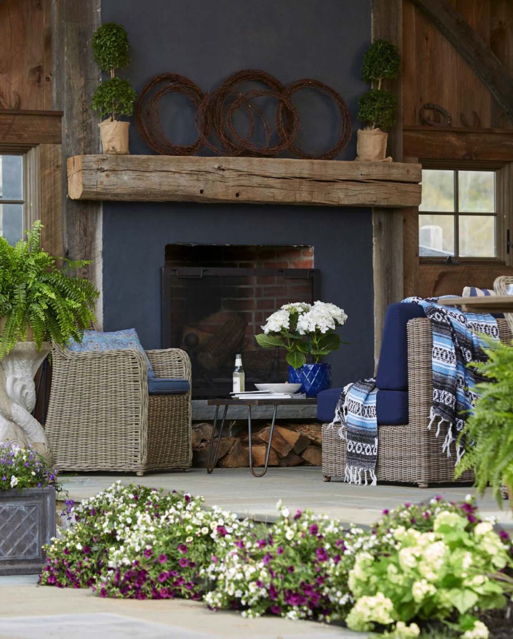 An outdoor fireplace makes the porch feel just a second living room