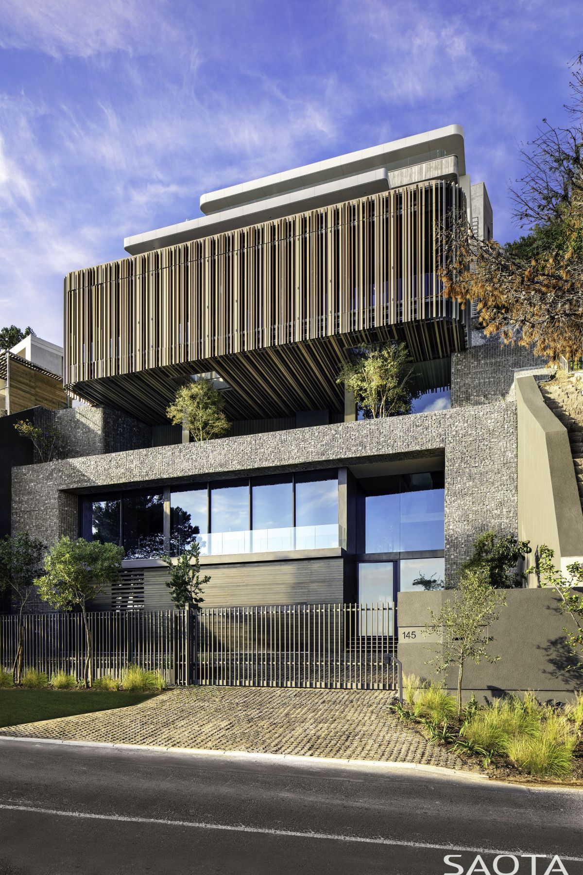 No matter how you look at it, the house looks like a collection of individually-shaped volumes with unique character