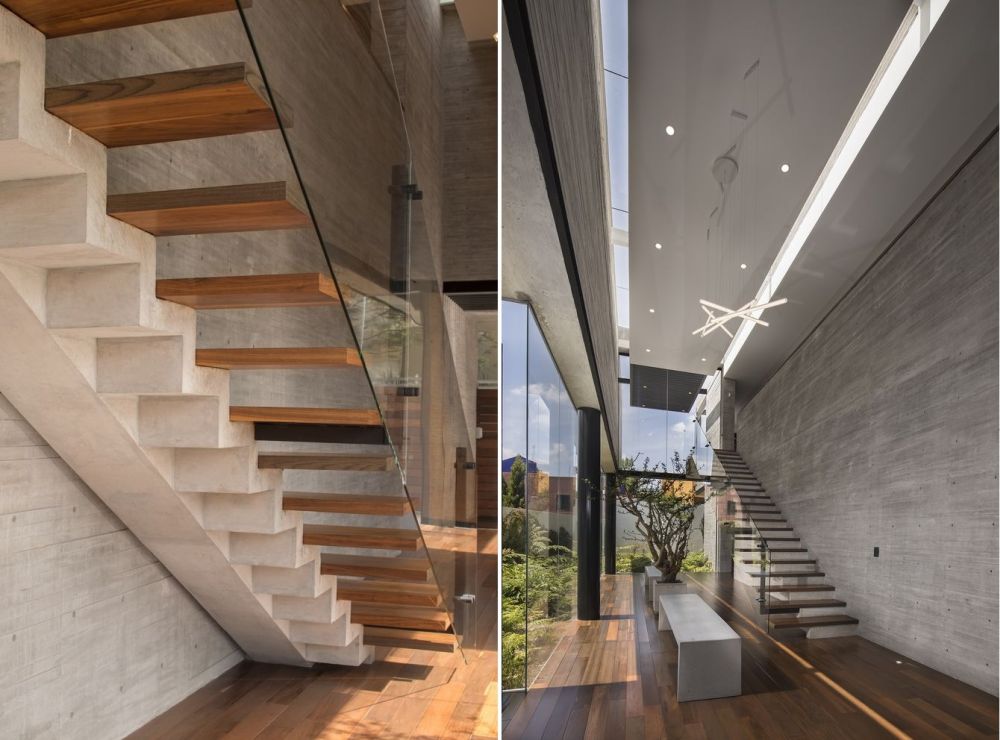 The staircase is a major design feature for the entire ground floor. It has a concrete structure and floating wooden steps