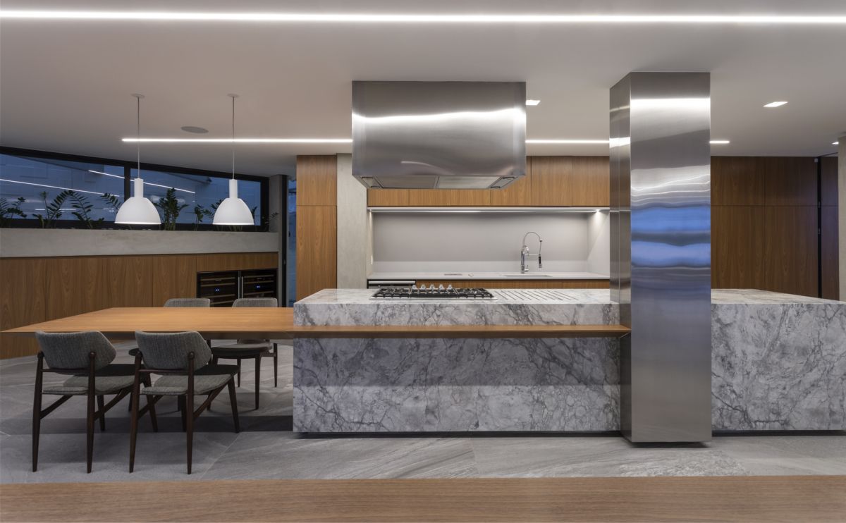The choice of materials and finishes aims to create a timeless aesthetic throughout the residence