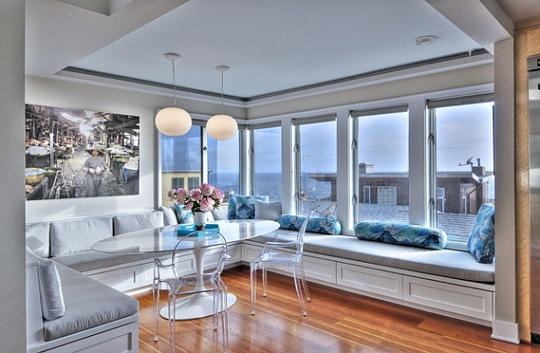 Beautiful modern dining area with Eero Saarinen Oval Tulip Table