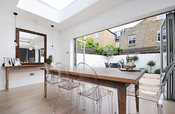 Combine a wooden table with the Ghost Chairs to blend contrasting styles