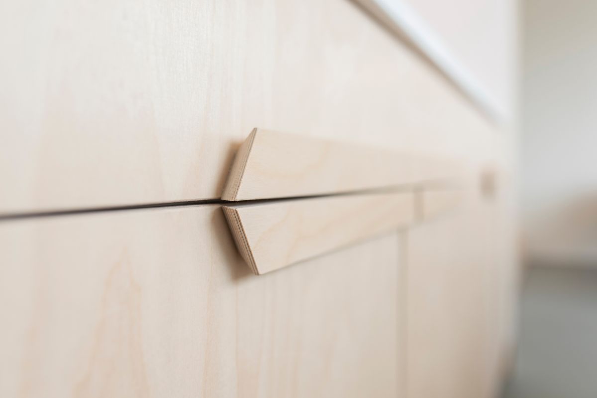 The furniture throughout the apartment was custom designed and looks very simple yet also very stylish