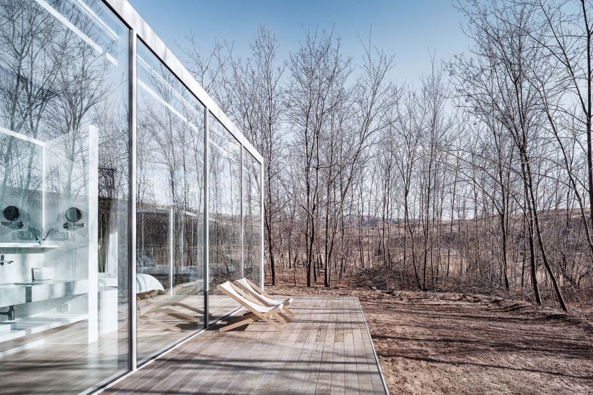 The modules are framed by full-height glass walls on three sides and this opens them up to the views