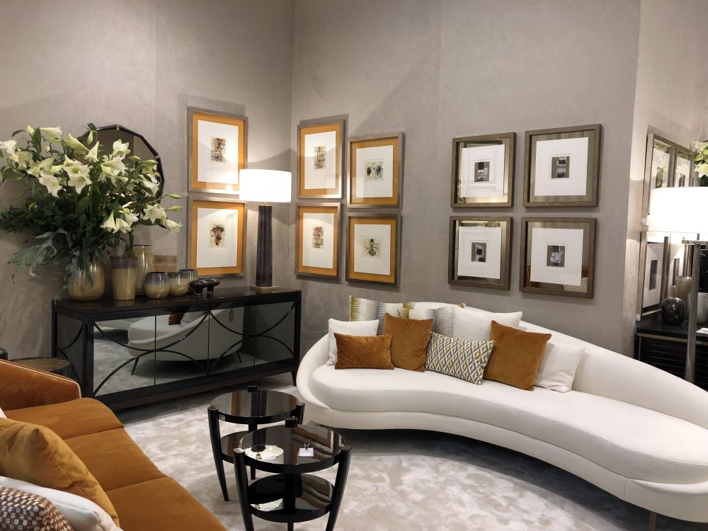 Turn one of the walls of your living room into art galleries by displaying framed artwork