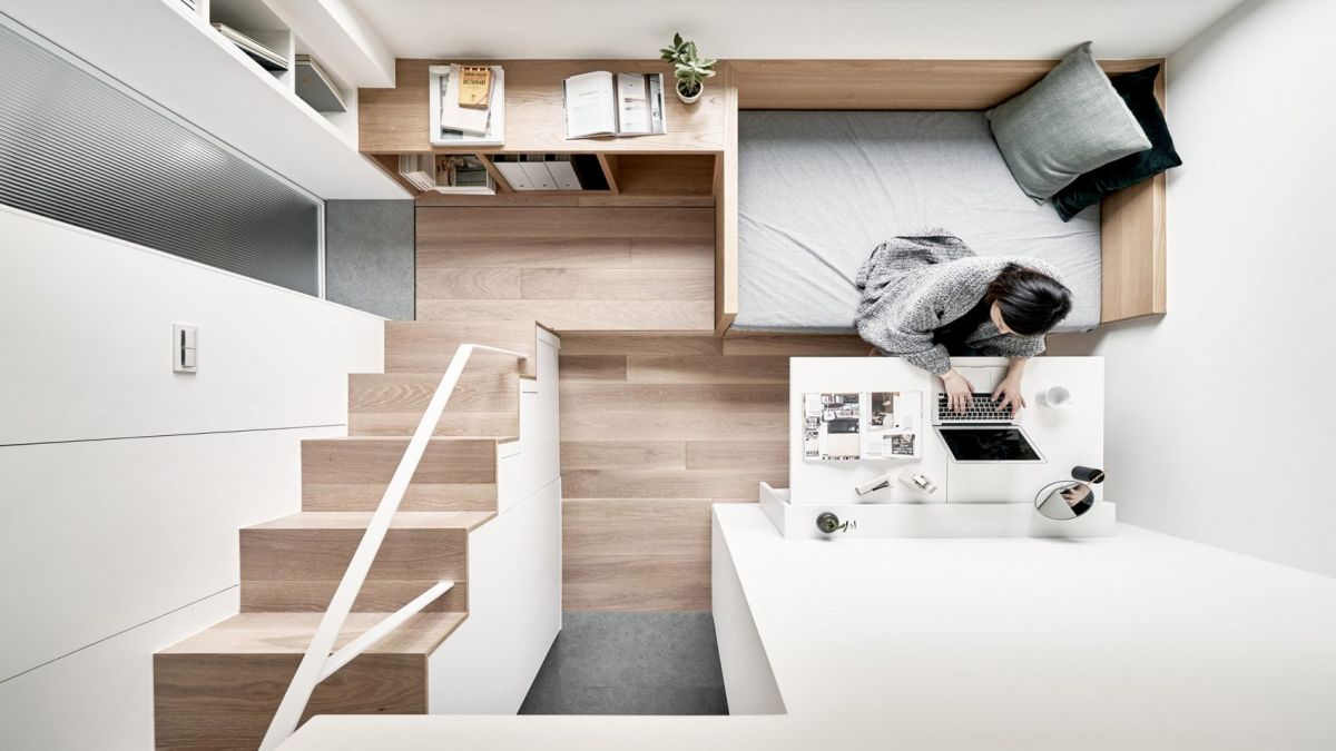The apartment is tiny and to combat that the architect relied a lot of multifunctional furniture