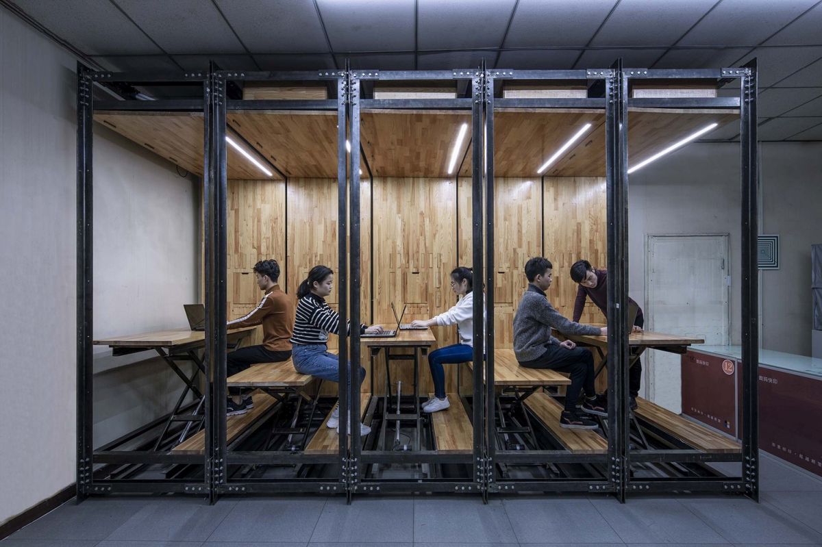 The glass exterior allows the new workspace to feel like a part of the large office