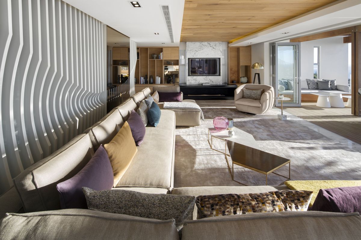 The house is infused with various ethnic elements and references, including pieces done by local artists