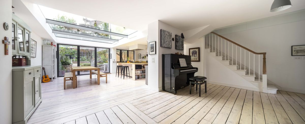 The original floor boards were preserved and under-floor heating was installed during the renovation