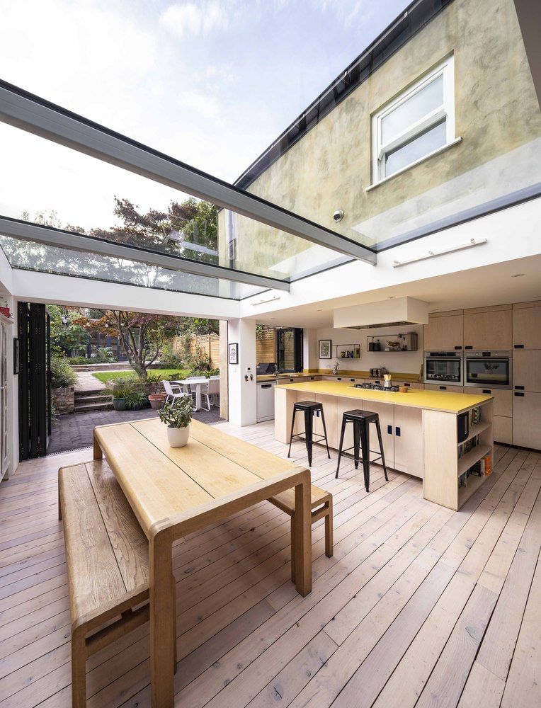 The new kitchen and dining area are blended into a single open space