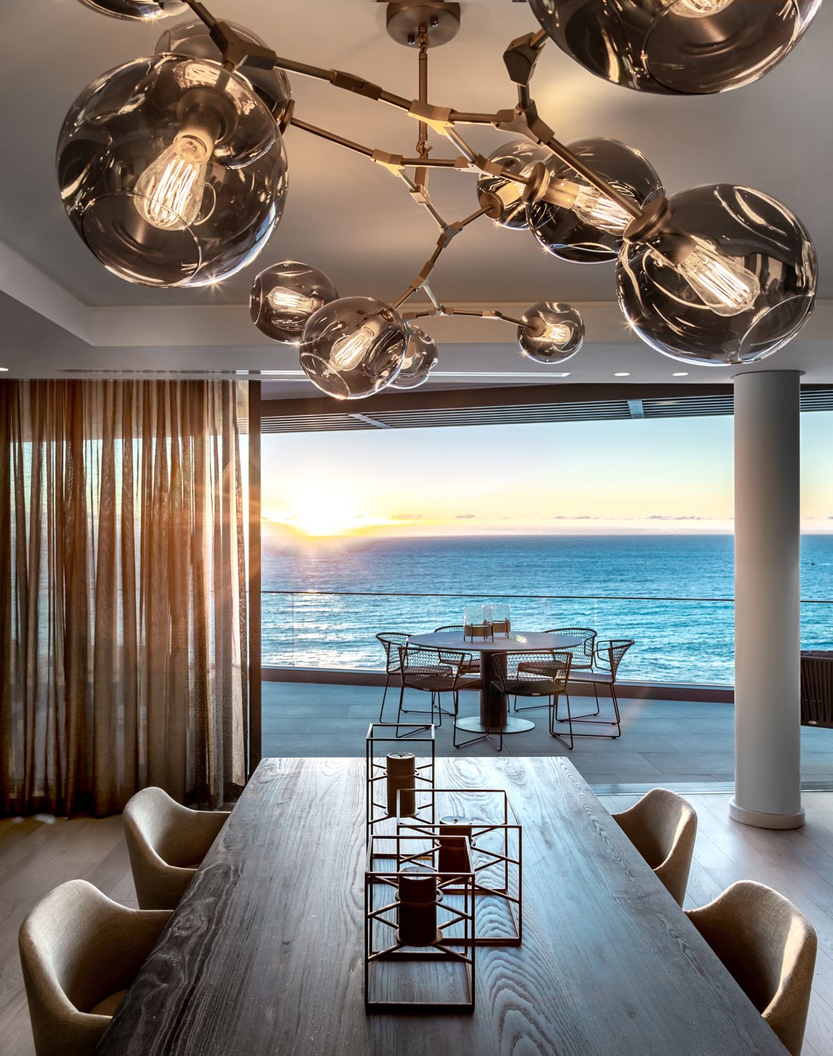 The terrace overlooks the Atlantic Ocean, offering panoramic views and letting in lots of sunlight