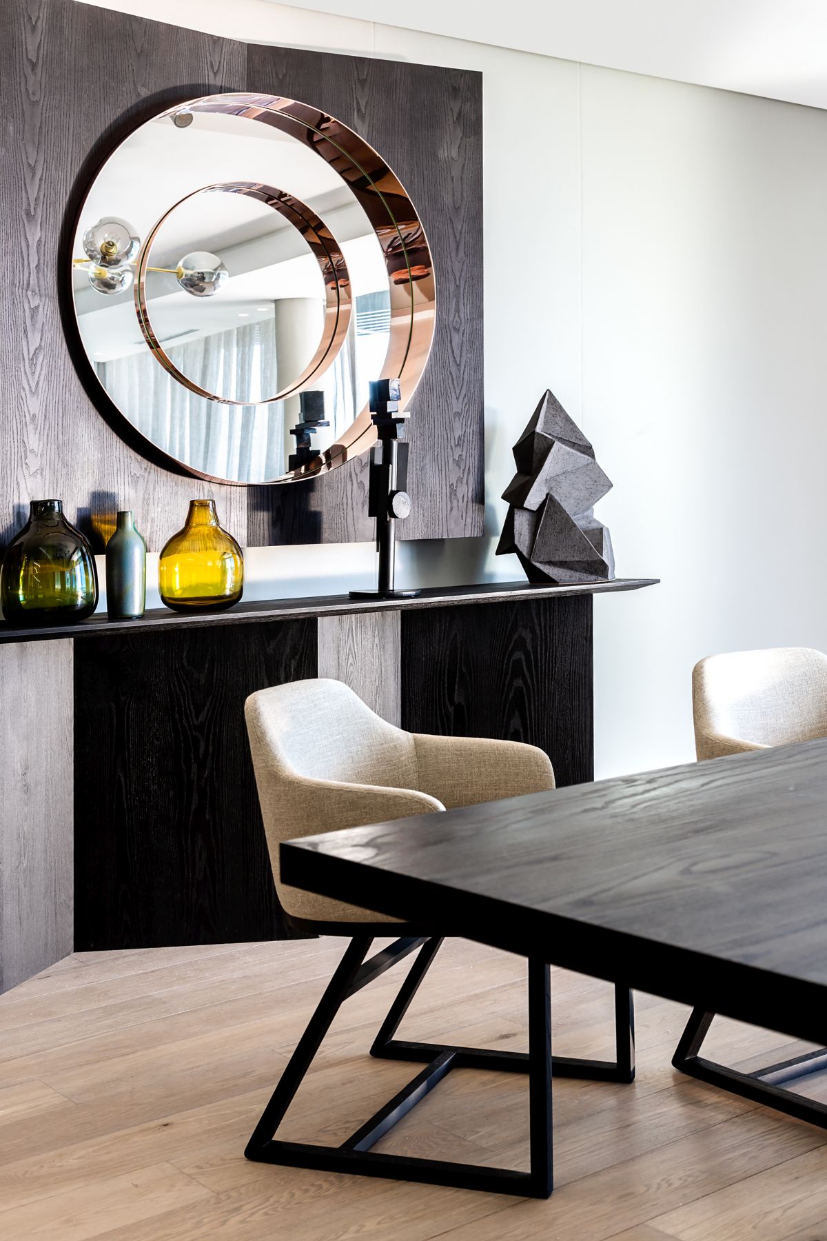 The combination of materials featured throughout the apartment is wonderfully balanced