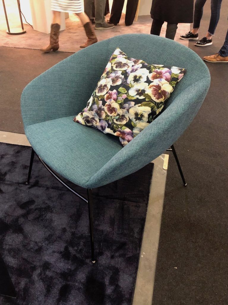 Mid-century modern inspiration gets the tweed treatment in this chair.