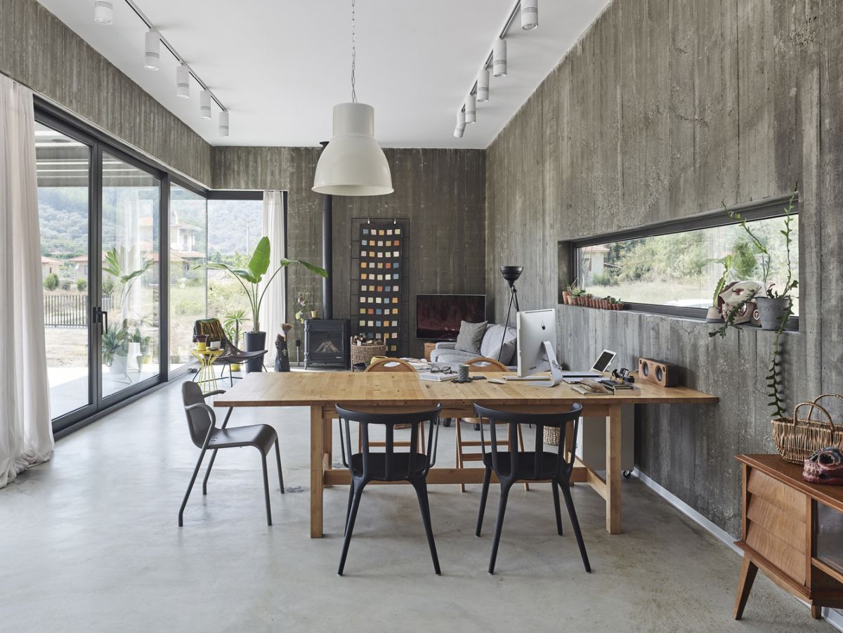 The interior is simple and welcoming, with a design that emphasizes the materials and their natural beauty