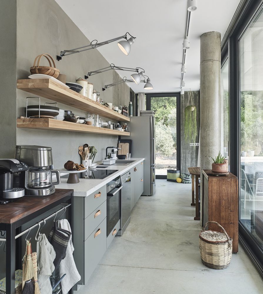 The kitchen is long and narrow but spacious enough and with plenty of storage for everything