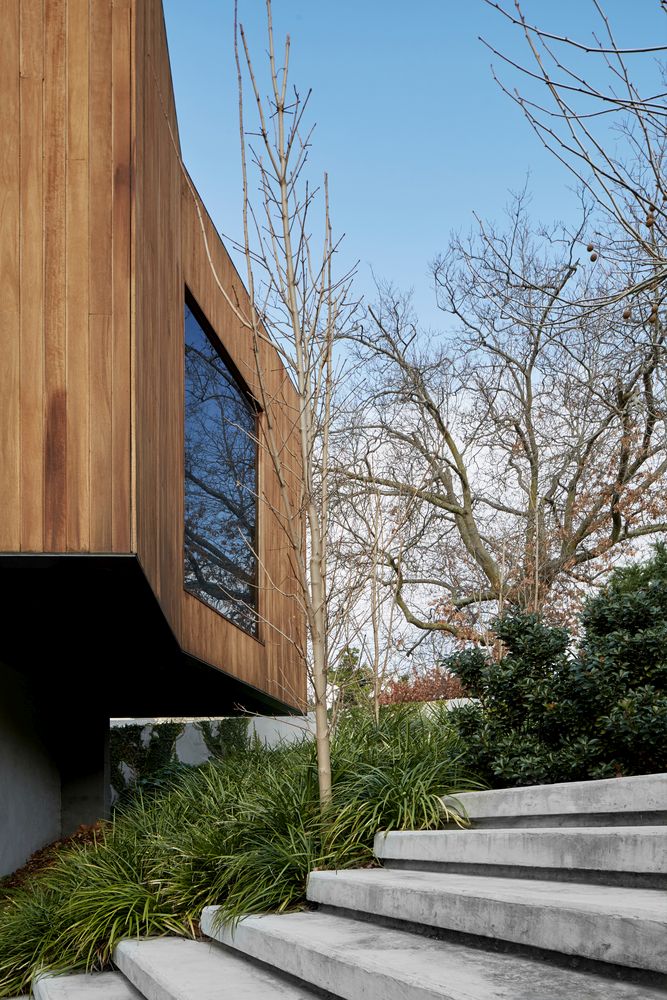 Despite the lack of huge windows and openings, the indoor-outdoor connection is very strong