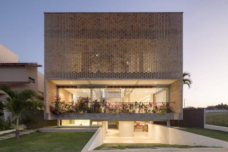 Perforated Brick Facades Make a Home More Stylish and Energy Efficient