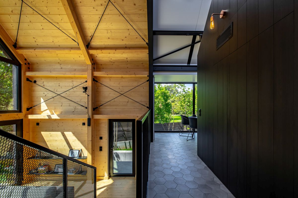 Upstairs, the floor features hexagonal tiles which add a modern vibe to the decor