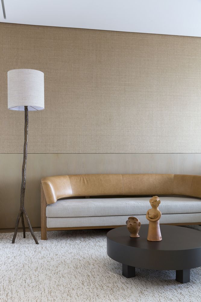 The overall aesthetic of this apartment is a minimalist and sophisticated one