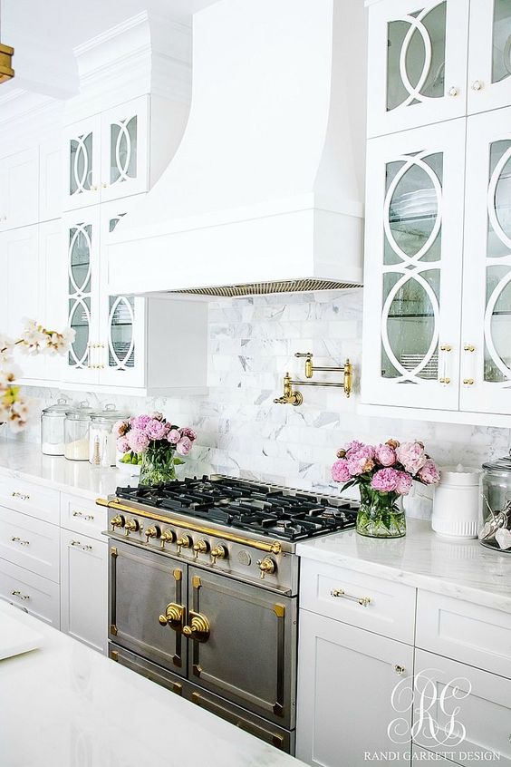 all white luxury kitchen with marble work top