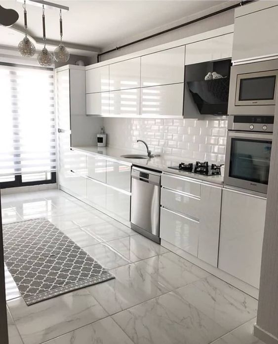 modern all white kitchen with metro tiles