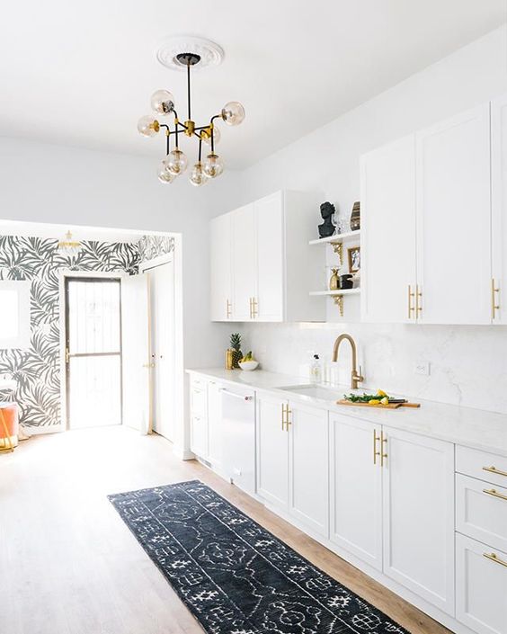 all white kitchen with gold touches
