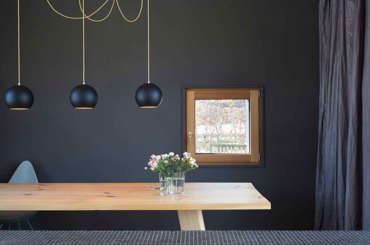 The black interior walls give the house an elegant and modern vibe 