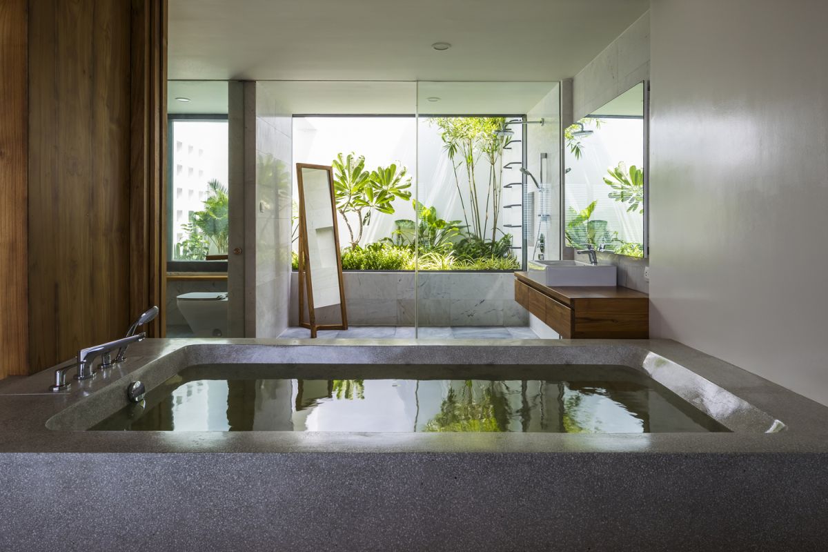 The master bedroom suite enjoys a wonderful spa-like vibe thanks to the private garden