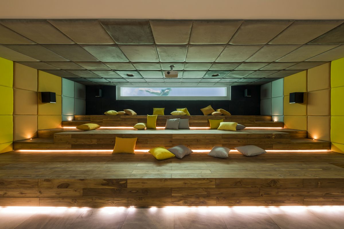 At street level the house features a large home cinema complete with accent lighting and comfy seats