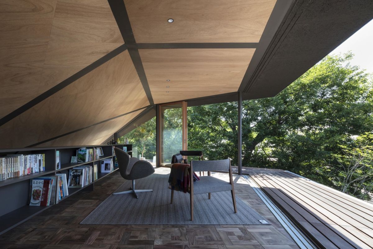 Sliding doors allow the interior spaces to become one with the surroundings, bringing in the fresh breeze