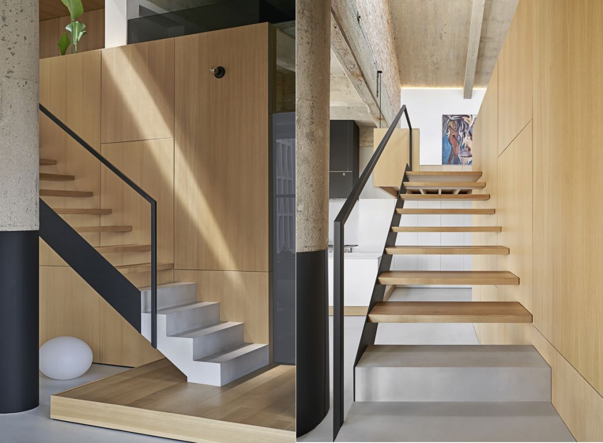 The loft area can be accessed via a staircase made of metal, wood and concrete