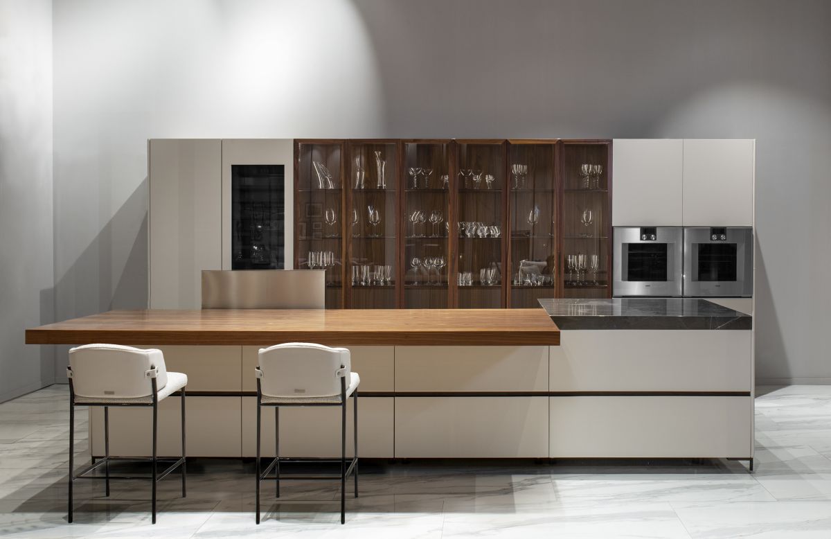 The barstools perfectly complement the sliding island top and they feature metal frames and comfortable made with a blend of fabric and leather