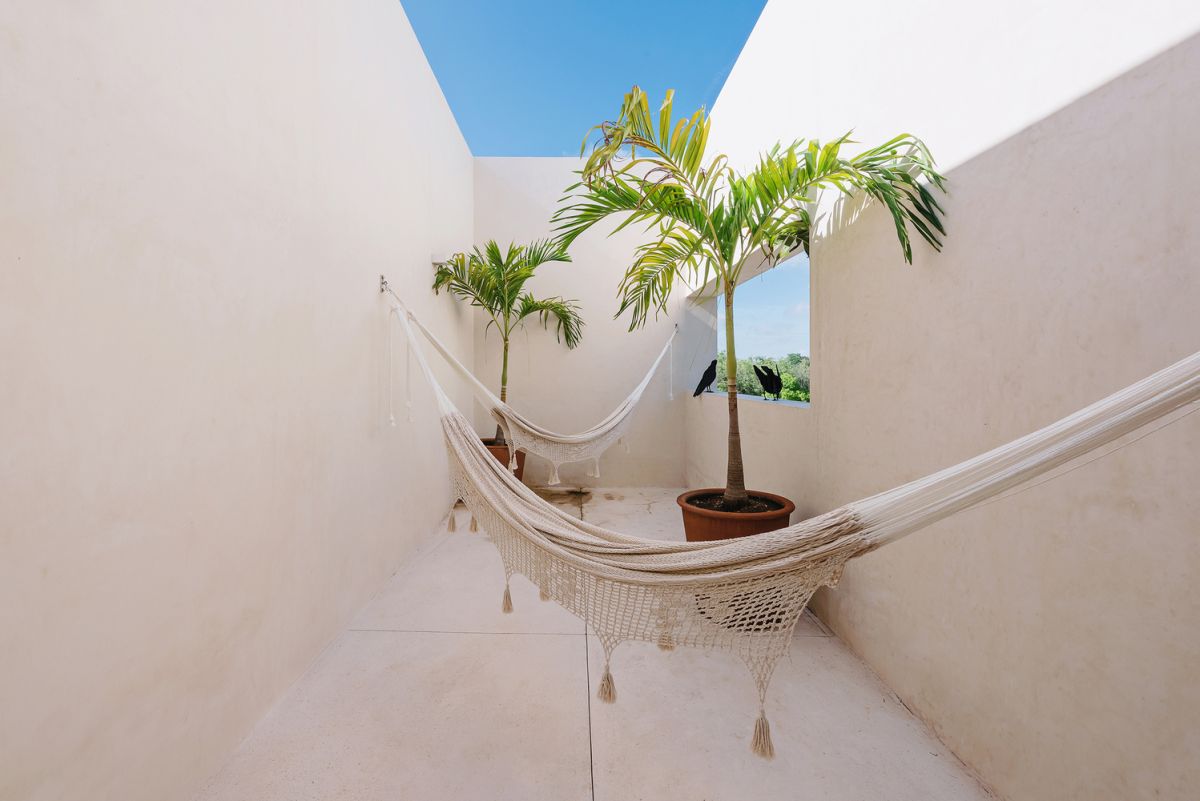 The other sections of the house enjoy their own special connection with the outdoors in the form of individual little courtyards
