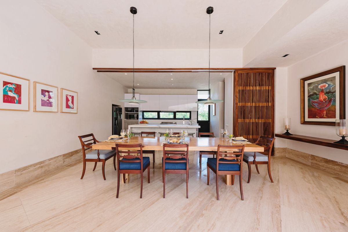 The sliding screens offer flexibility, allowing the two spaces to become one