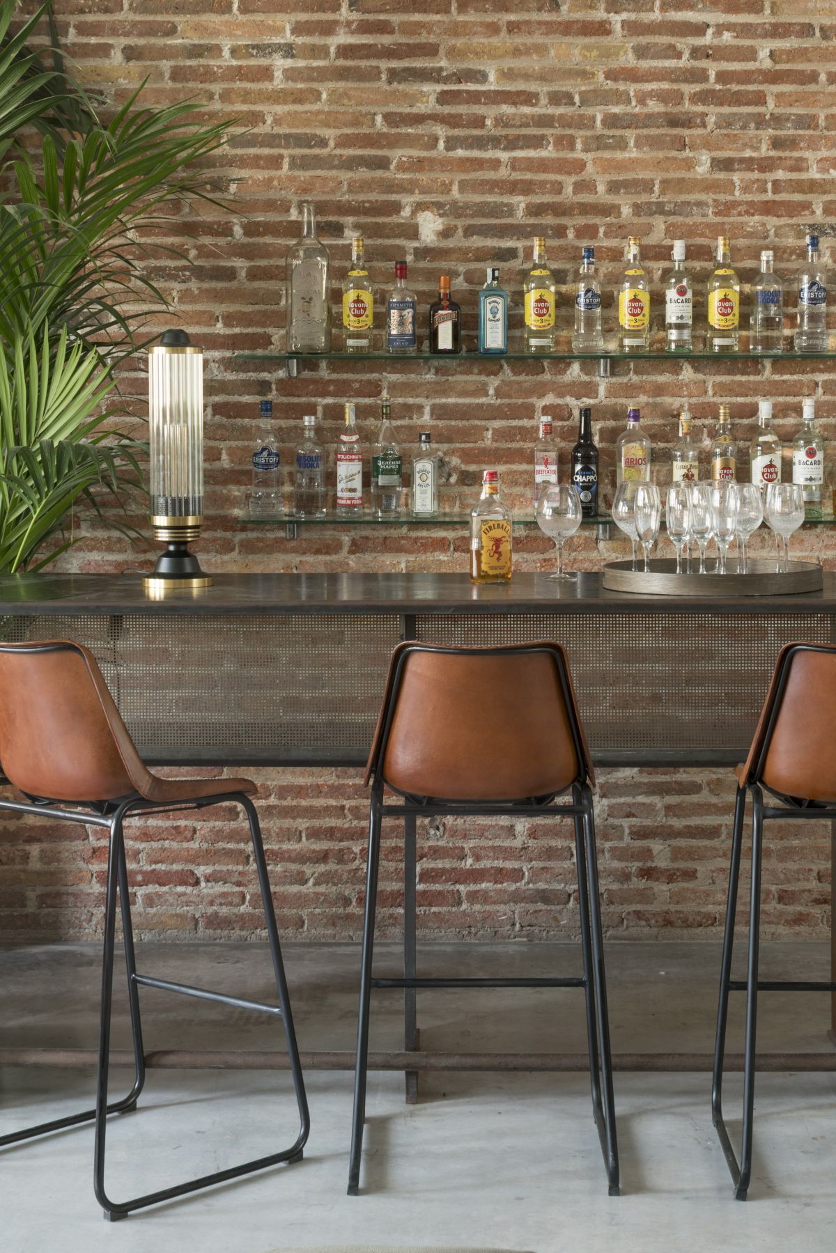 The new design preserves a lot of the original features of the apartment including the brick walls