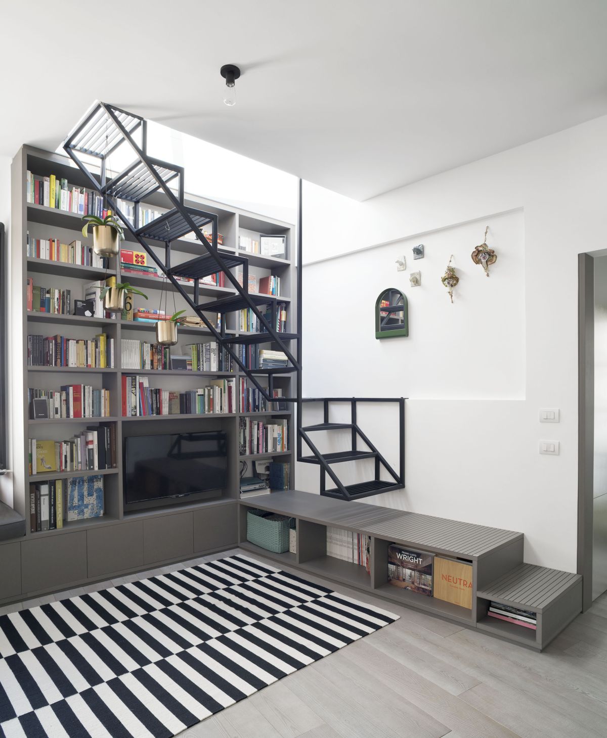 The stairs are integrated into the furniture is a surprisingly seamless manner