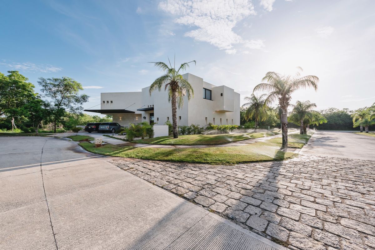 The house is exposed to the street on three sides which limits its overall privacy