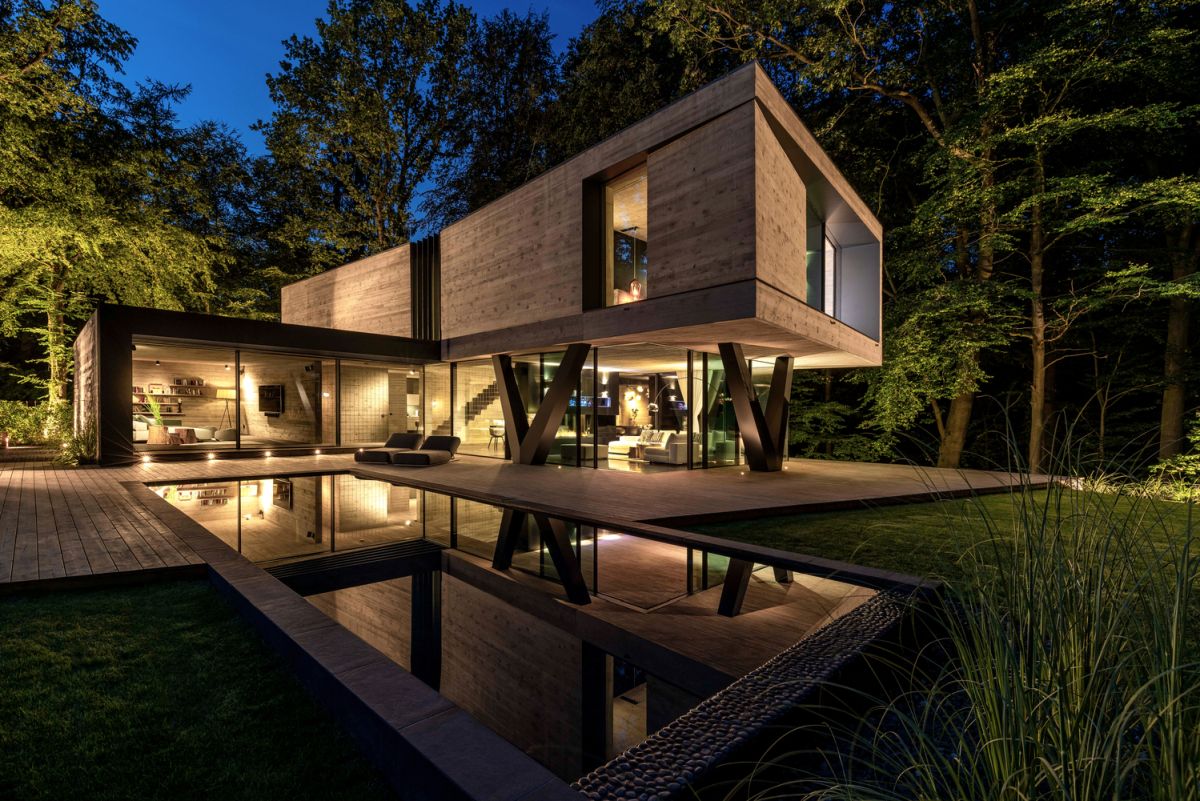 The living areas form an L-shaped floor plan which shelters an intimate outdoor terrace