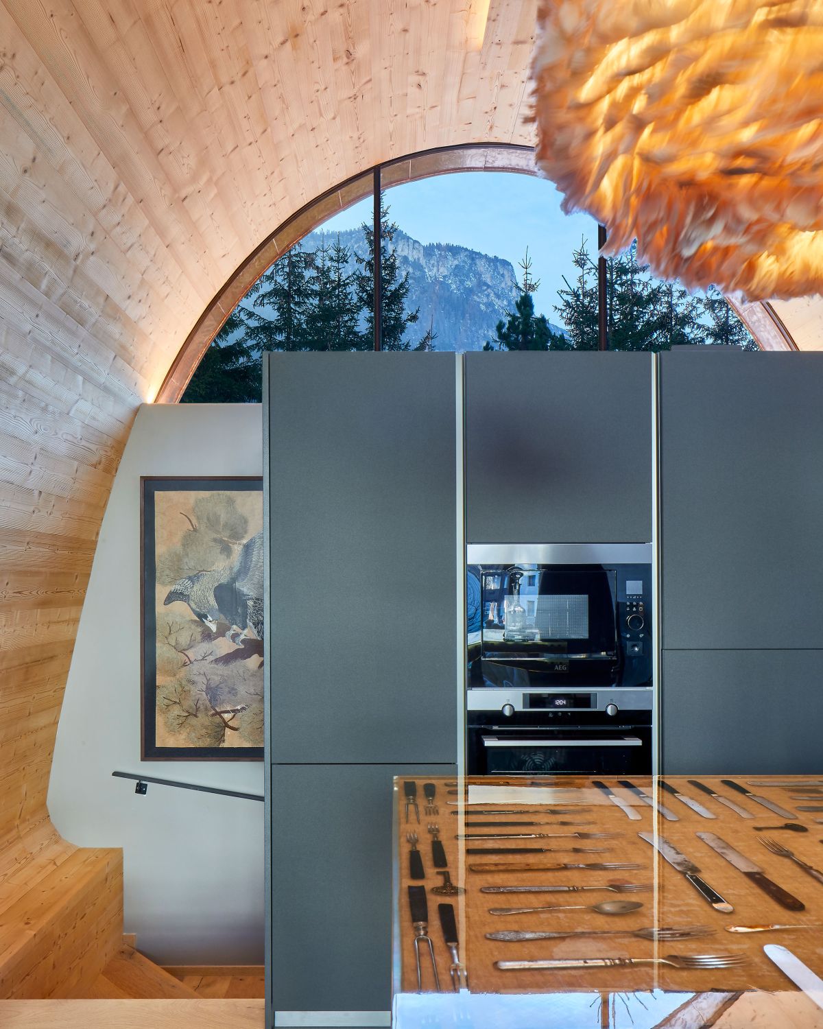 The interior is just as pleasant and cozy-looking as the exterior, featuring expansive wooden surfaces