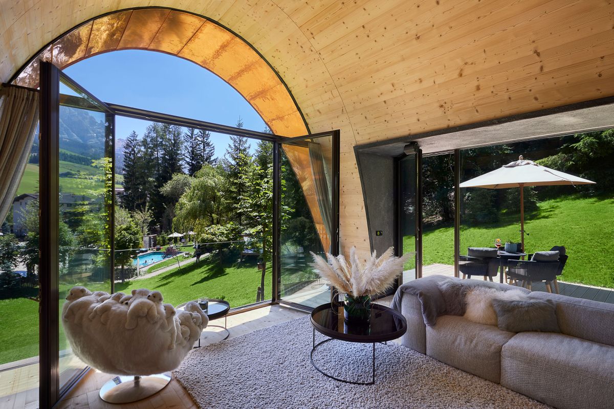 The living room enjoys the best views and has direct access to the outdoors