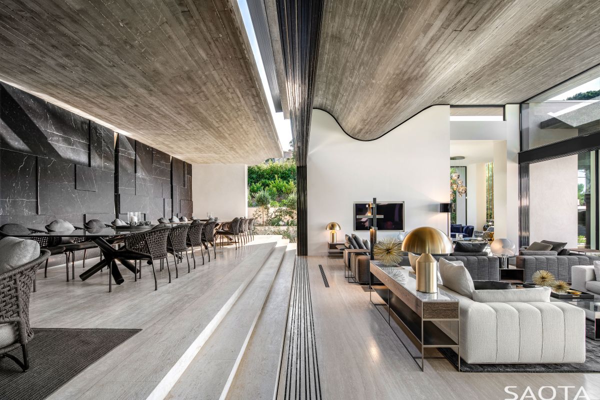 This central section houses the entertainment areas and main living space