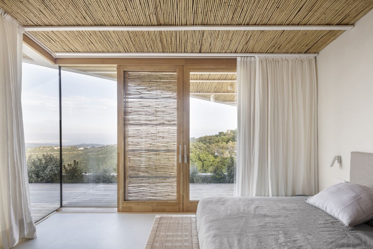 There's a great view through the corner of this bedroom