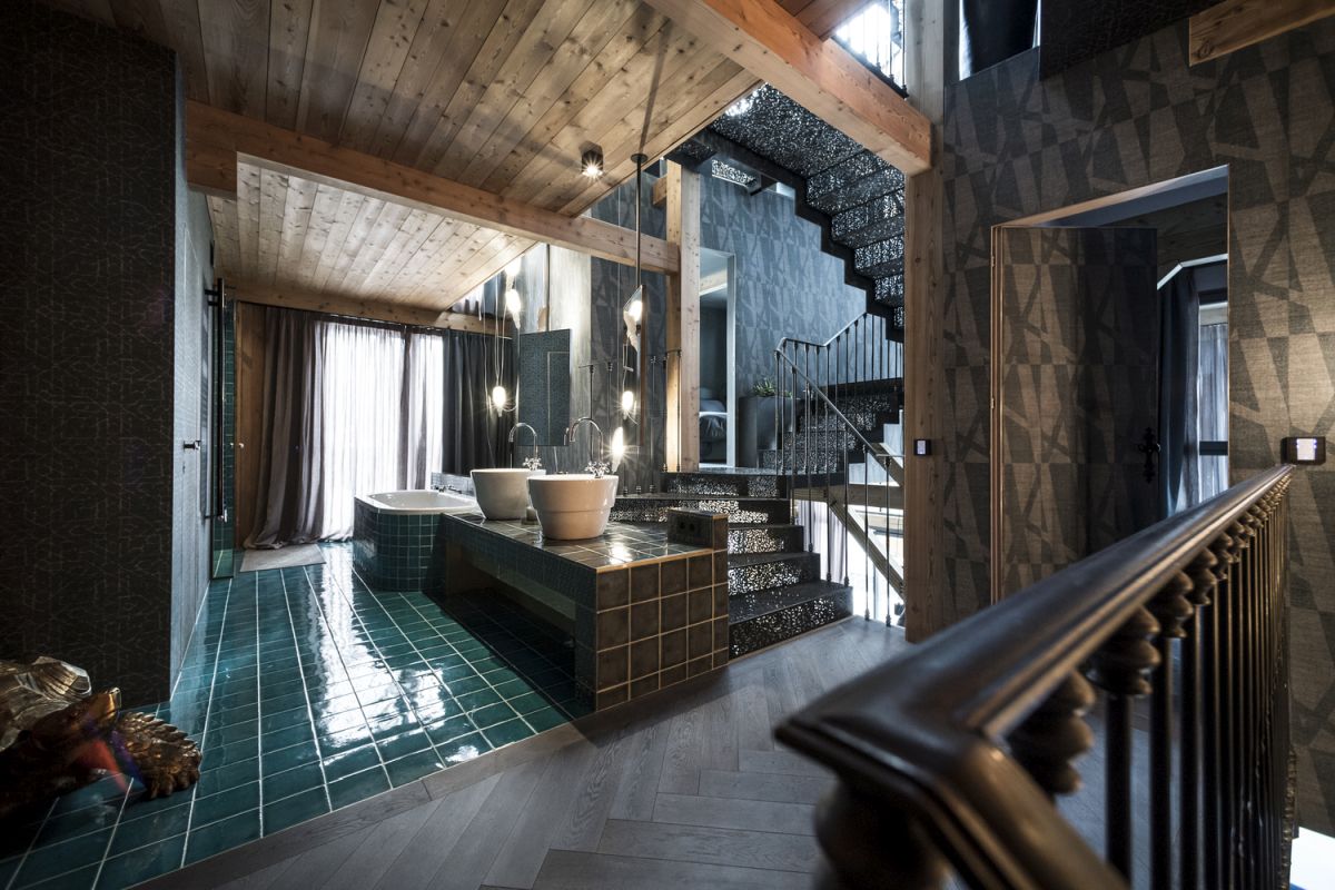 Inside, the spaces are warm and welcoming and the colors are dark and mostly neutral
