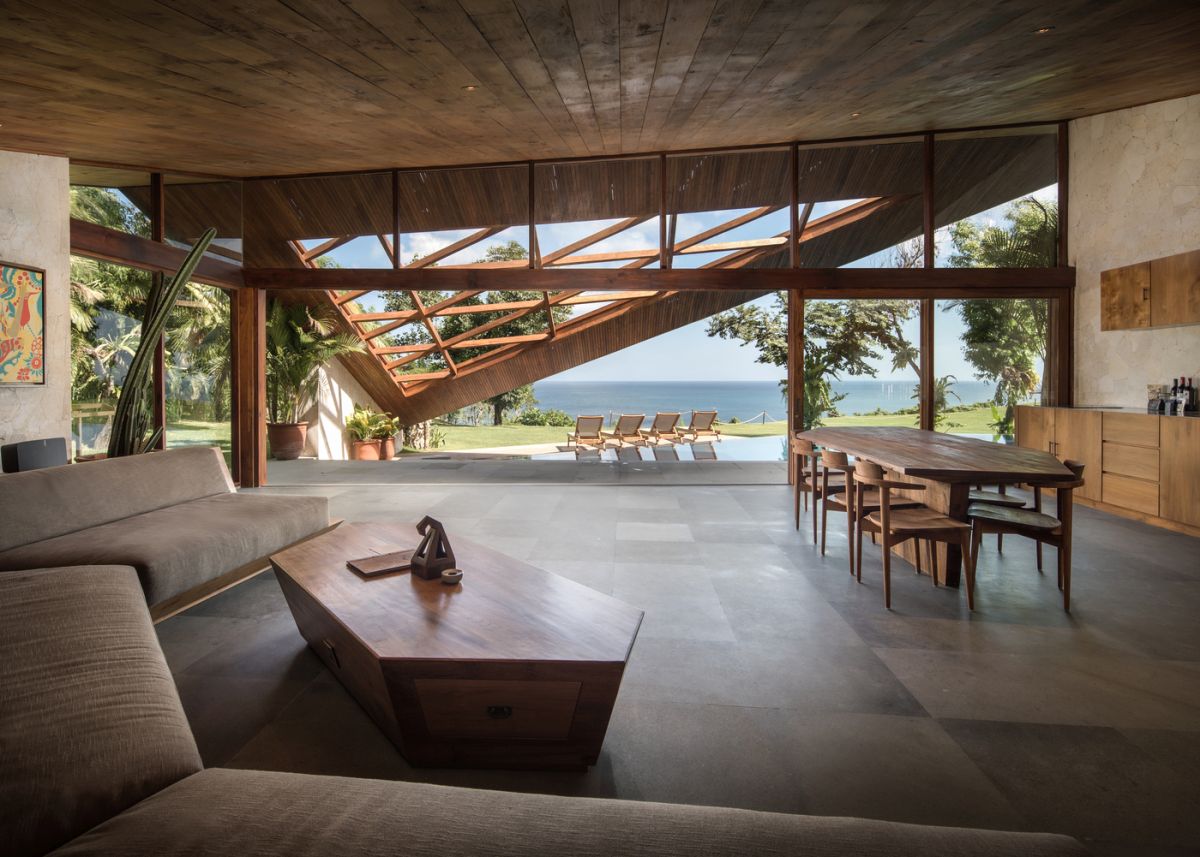 Inside, there's a vast and open social area with a simple yet very welcoming design